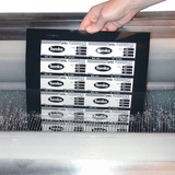 Step 6 :: Rinse the processing fluids off the plate by placing it in a Metalphoto Rinse<br />Tank Unit that simultaneously rinses both sides. Up to this point in the process,<br />the anodized layer of the plate is unsealed. In fact, Zip processing, rinsing, as<br />well as any additive color steps, occurs within the unsealed anodized layer.